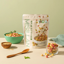 Céréales bio au riz complet et aux légumes Misillan, présentation du sachet avec snack vegan croustillant