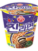 Petit bol de Jin Ramen légèrement épicé Ottogi 65 g, avec une illustration de nouilles coréennes garnies de bœuf, de champignons, d’un œuf, de ciboule et de piments.